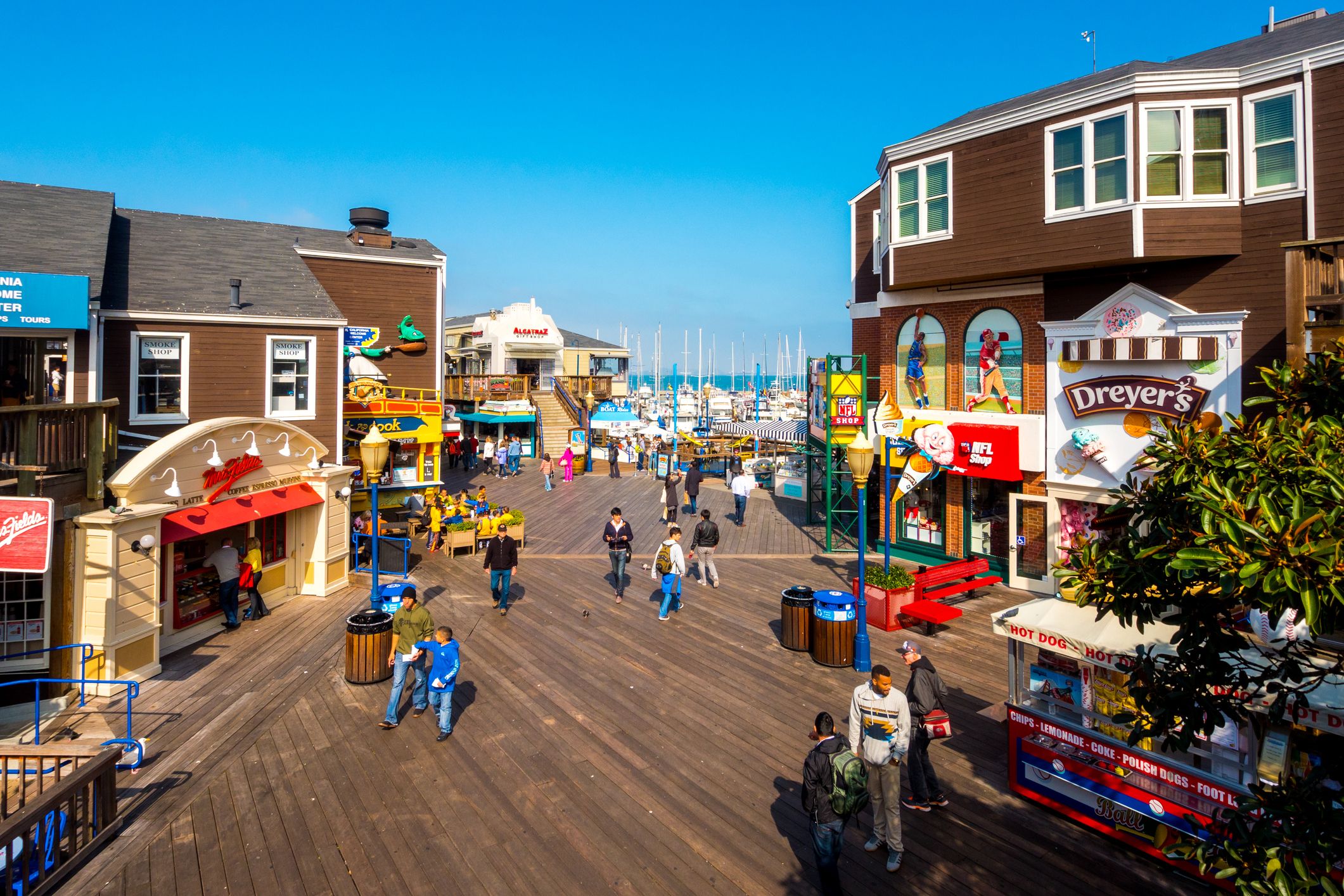 Fisherman's Wharf with people walking around and restaurants seen in San Francisco, California