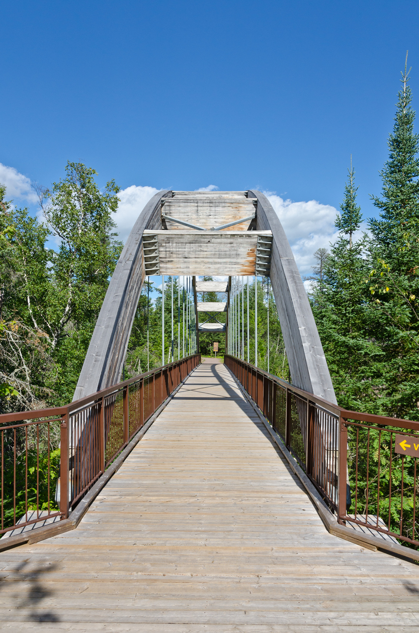 Curved wooden bridge near Thunder bay