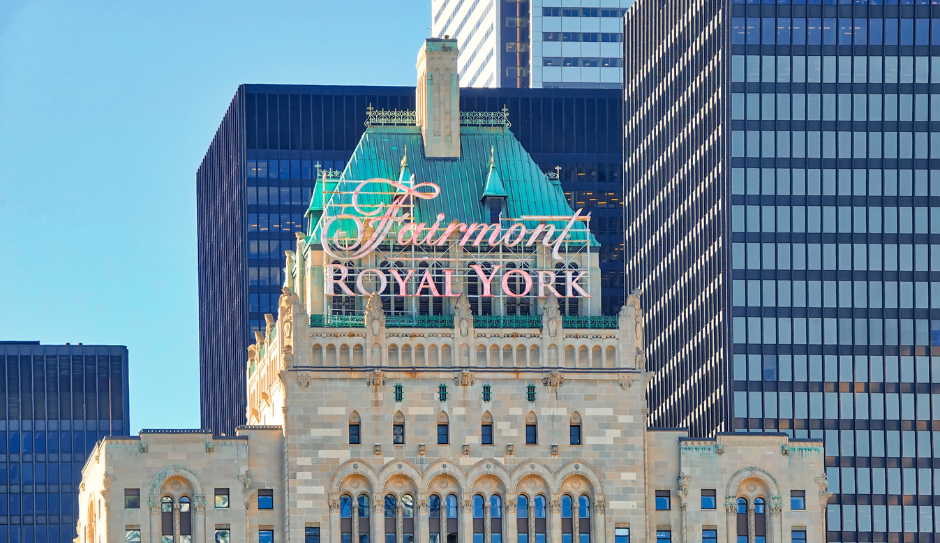 Famous Landmark Fairmont Royal York Hotel in Toronto facing Ontario Lake harbor