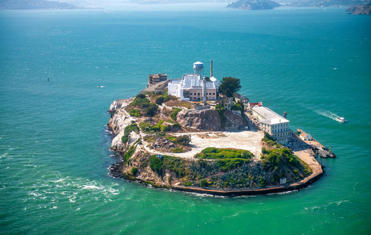 Alcatraz Island and Prison, aerial view from helicopter on a clear sunny day