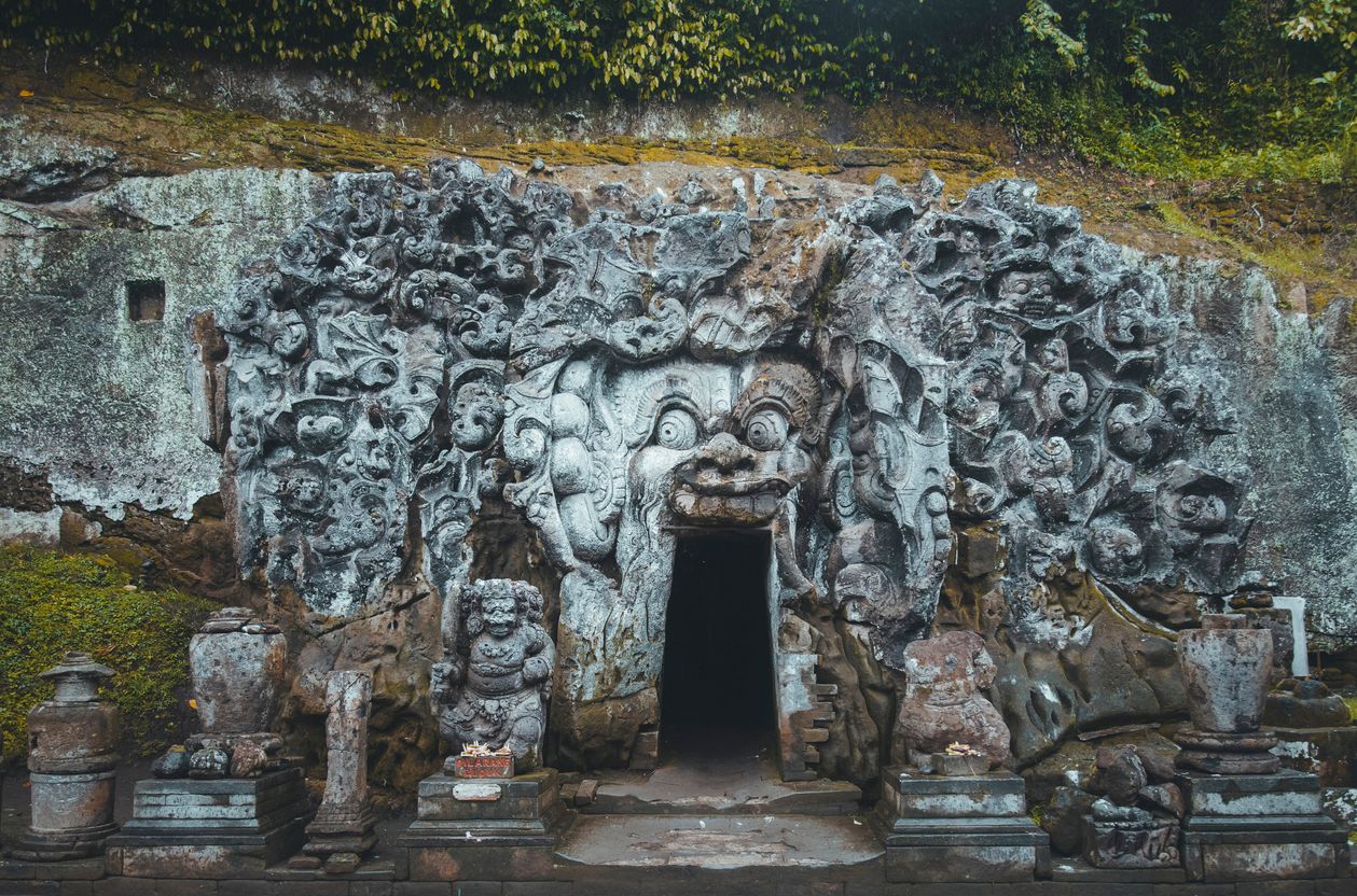 Ancient stone carving Elephant cave Bali Indonesia 