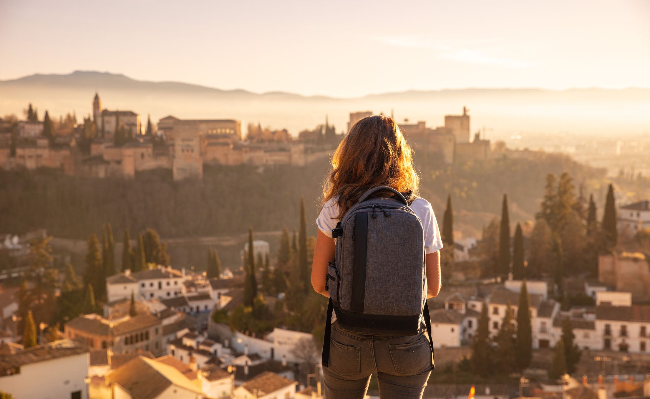 Woman traveler in Alhambra in Spain