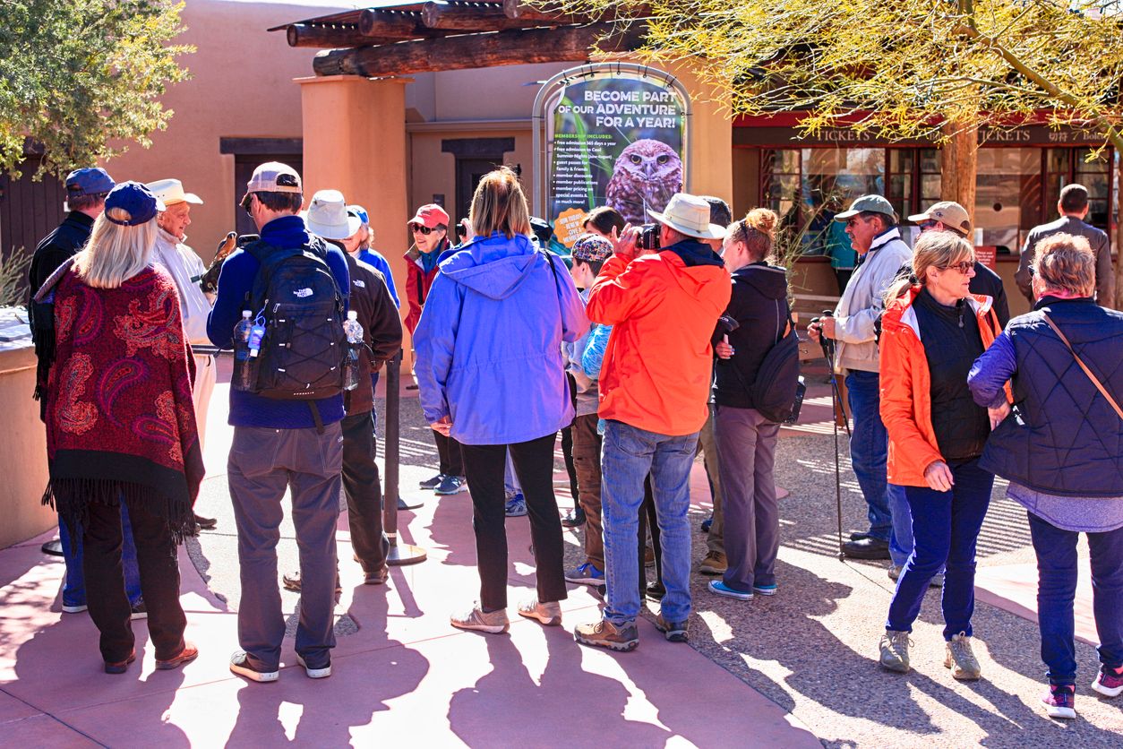 People listening to the welcome speech by an employee at the Arizona-Sonora Desert Museum in Tucson AZ