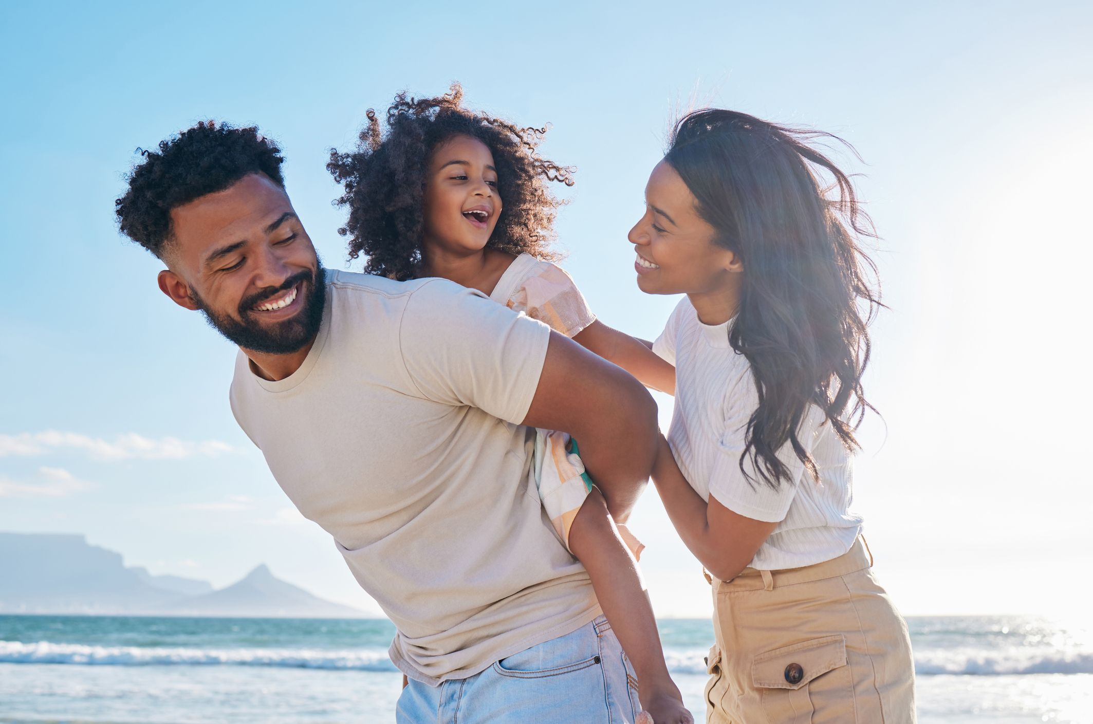 Young family on vacation smiling together