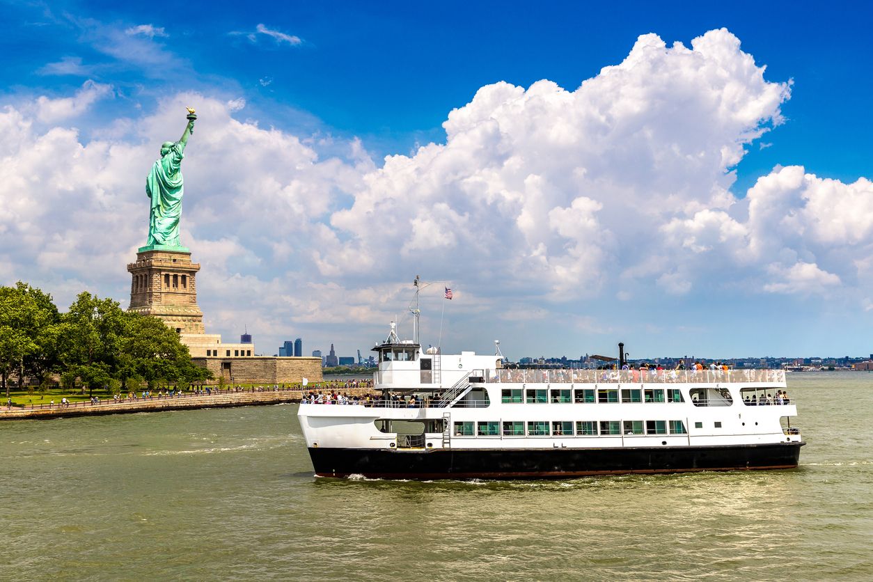 Statue of Liberty and boat tour in New York City, USA.
