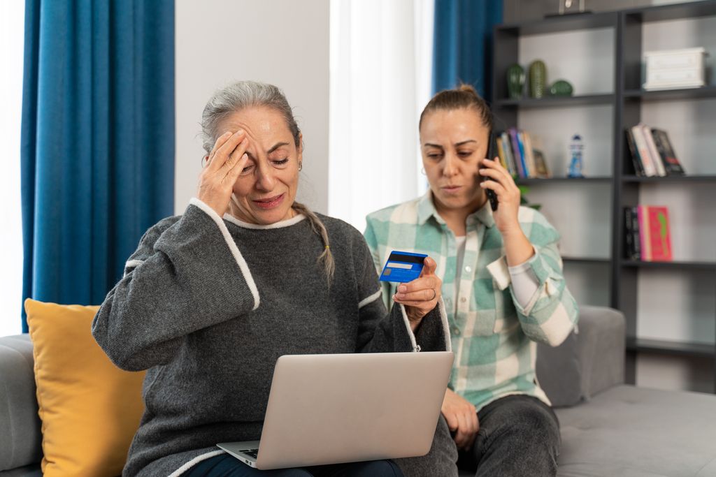 Senior woman realizes she was scammed while shopping online