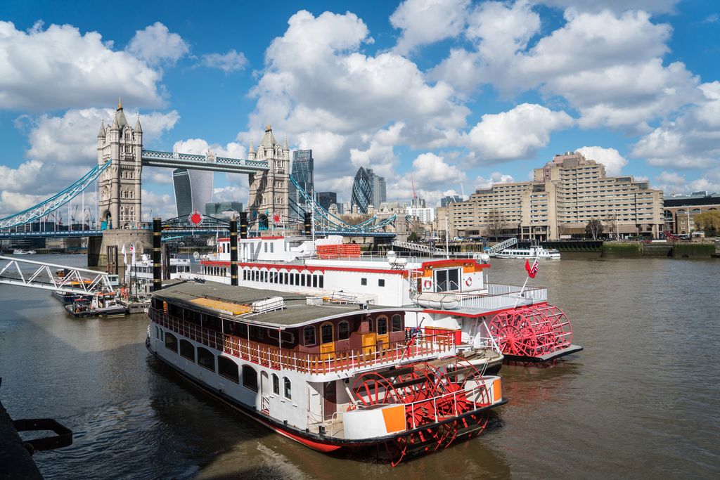 Tower Bridge and River Thames with recreational boats on the foreground, London, UK