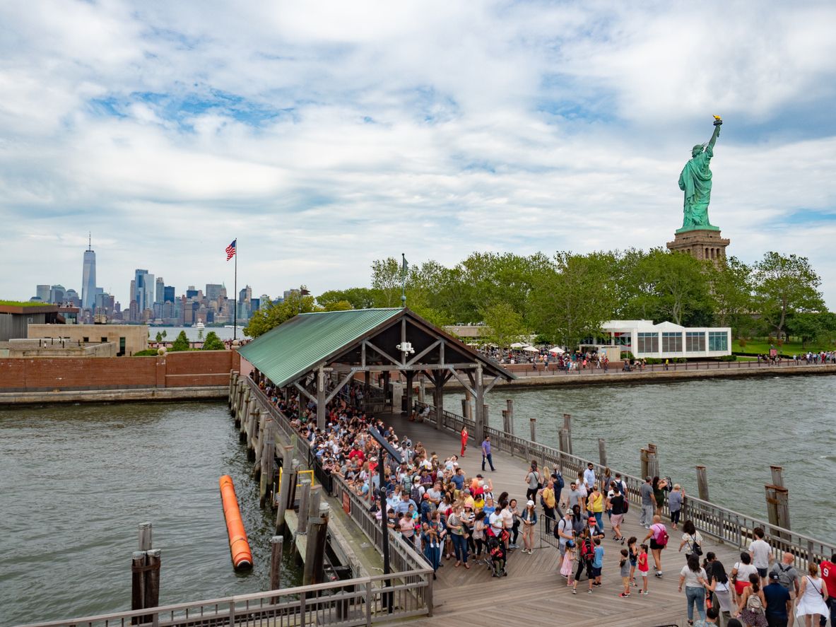 People waiting for their ferry to leave Liberty Island.