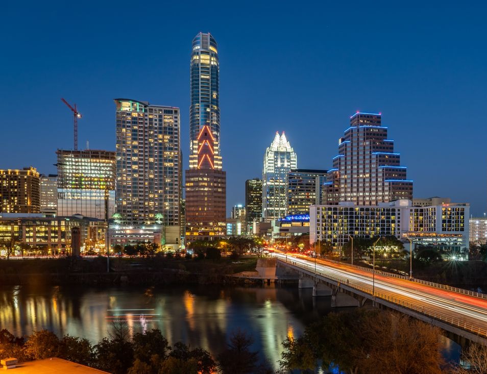 Austin Texas at night, skyscrapers from congress avenue bridge