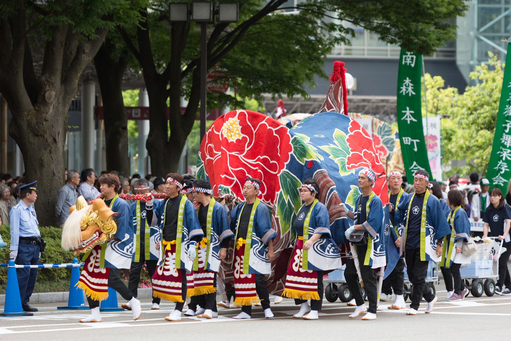 Parade team members participating the Kanazawa Hyakumangoku Festival in Kanazawa, Ishikawa, Japan.