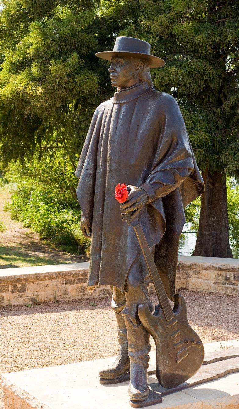 Stevie Ray Vaughn Memorial Statue along the river in Down Town Austin, Texas, USA