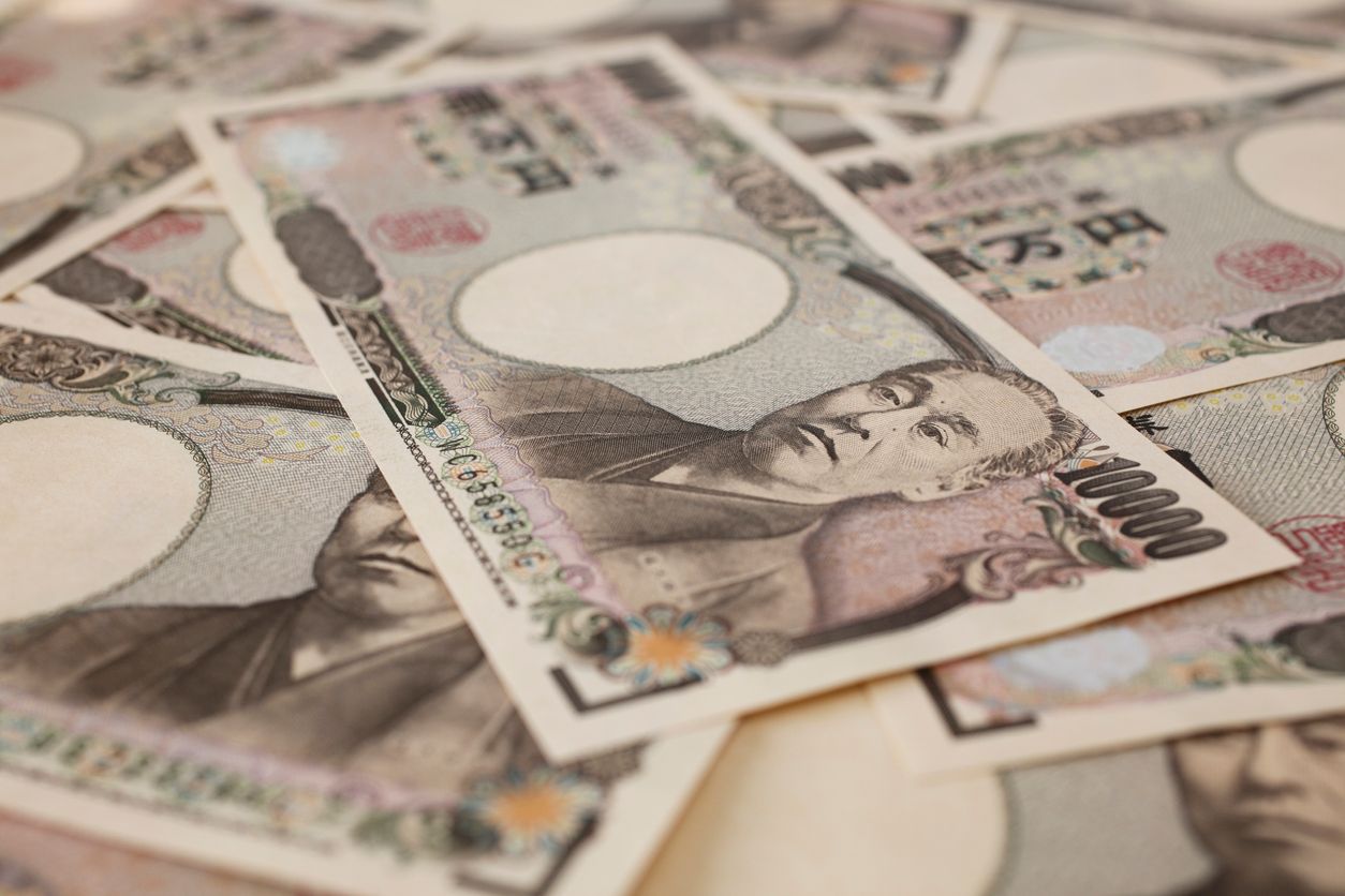 Close-up of 10,000 Japanese yen bills.