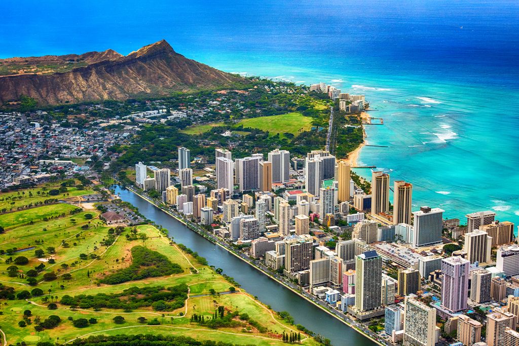 Waikiki area of Honolulu Hawaii with the volcanic crater, Diamond Head, in the background.