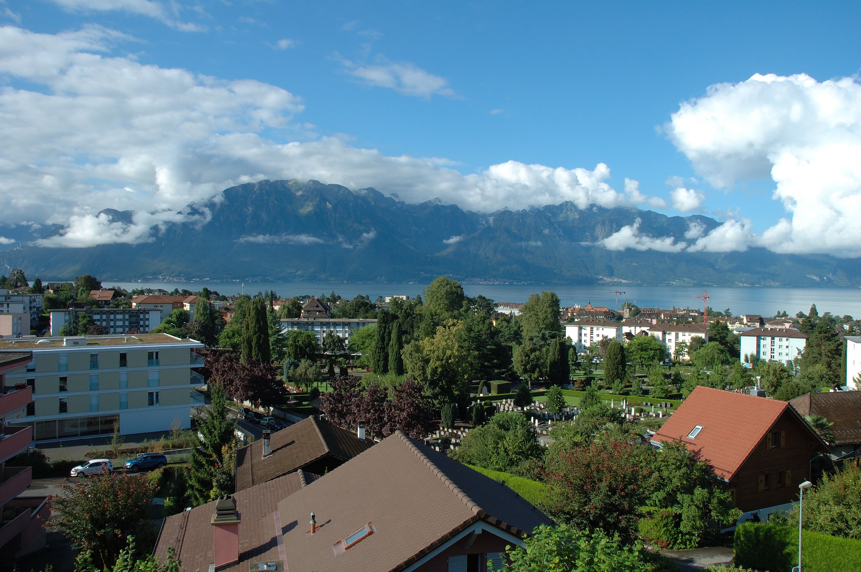 Mountains, lake and buildings in La Tour-de-Peilz in Switzerland