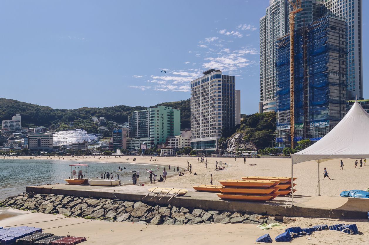 Landscape of Songdo beach with people relaxing, Busan, South Korea