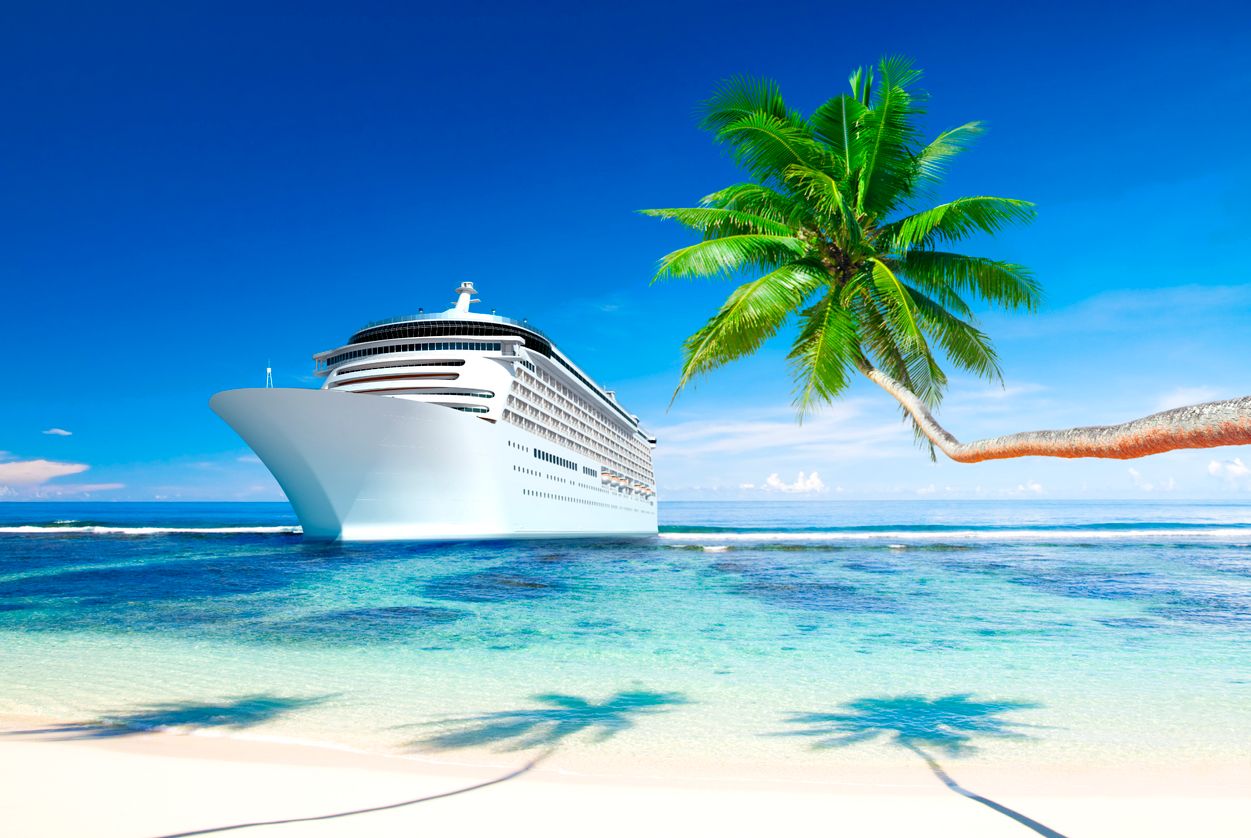 Cruise ship at bay of tropical island