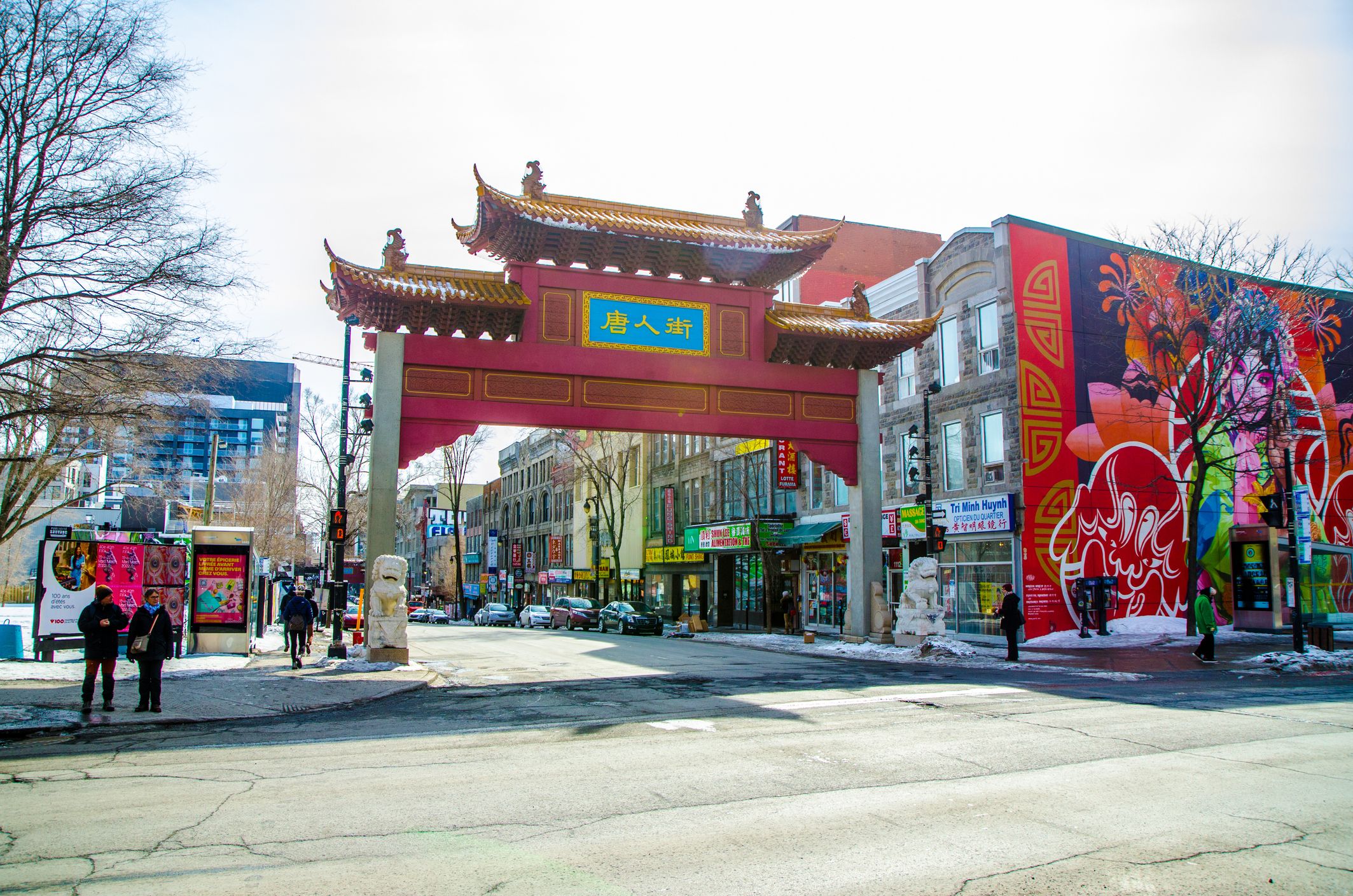 People beside Montreal Chinatown gate