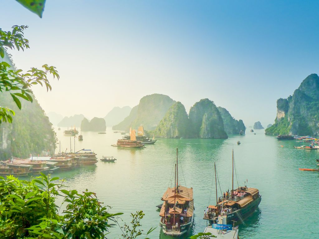 Aerial view of sunset and dawn near rock island, Halong Bay, Vietnam
