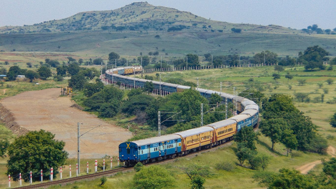 Bengalore New Delhi karnatak Superfast Express train on an S-curve