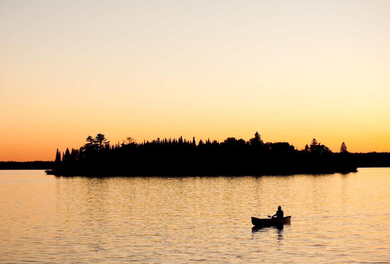 Man Canoeing in Canada 