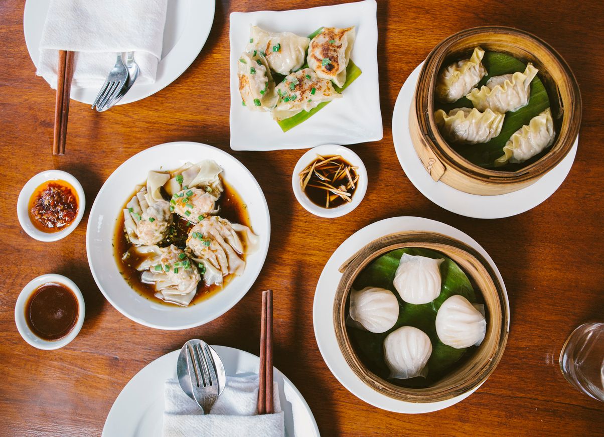 Shanghai dim sum pork dumplings and prawn dumplings with vinegar and ginger sauce.