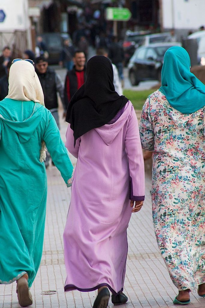 Muslim women wearing colourful clothes walking in Rabat