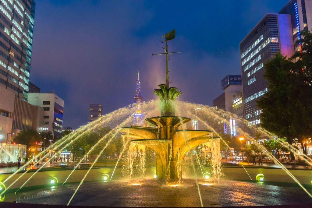 Illuminated fountain at night in Odori Park, Sapporo, Japan