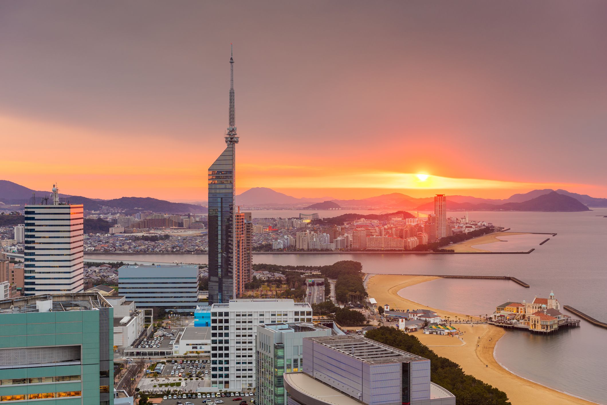 Fukuoka, Japan city skyline and tower at dusk