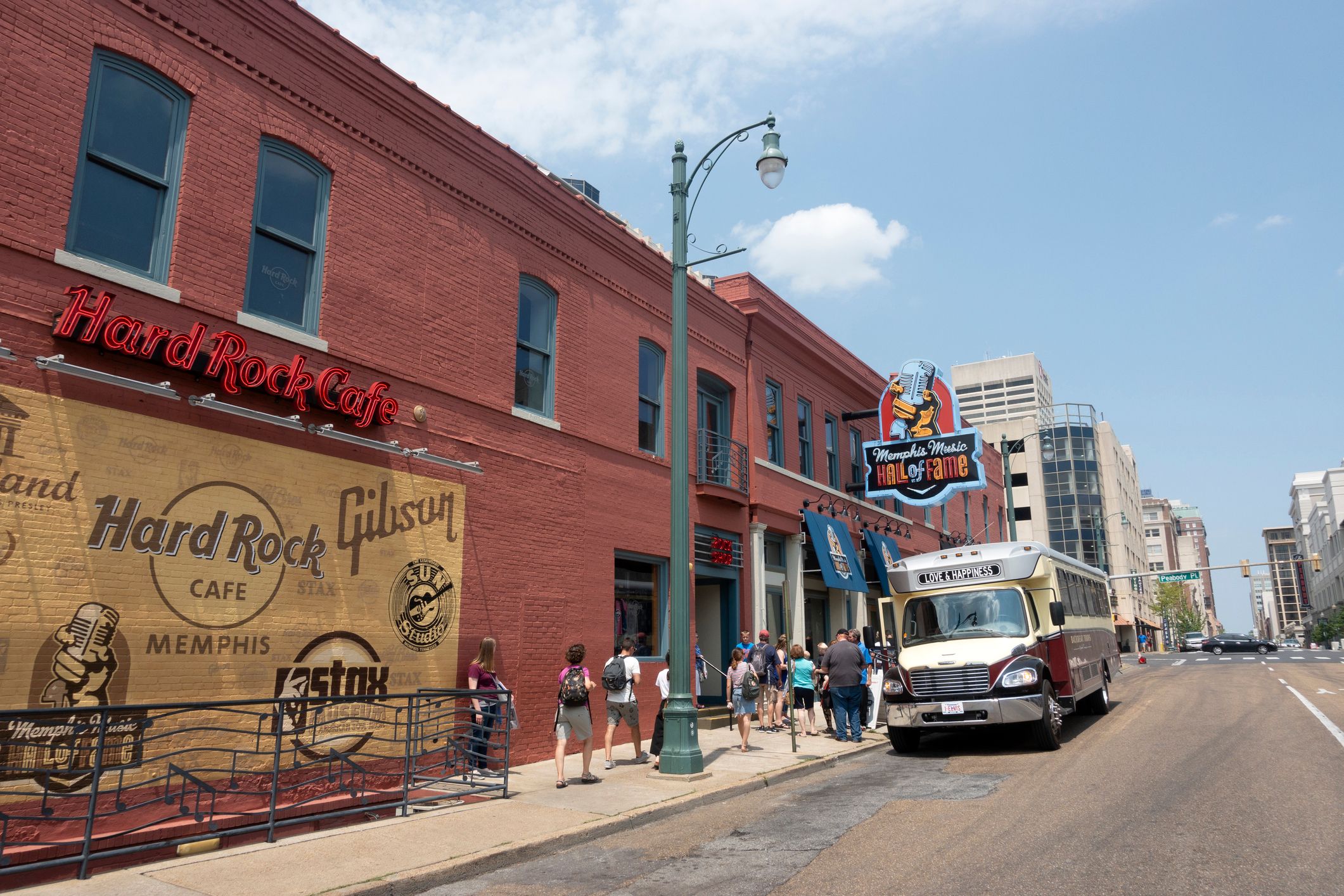 Memphis Music Hall of Fame with tour bus and people lining up outside