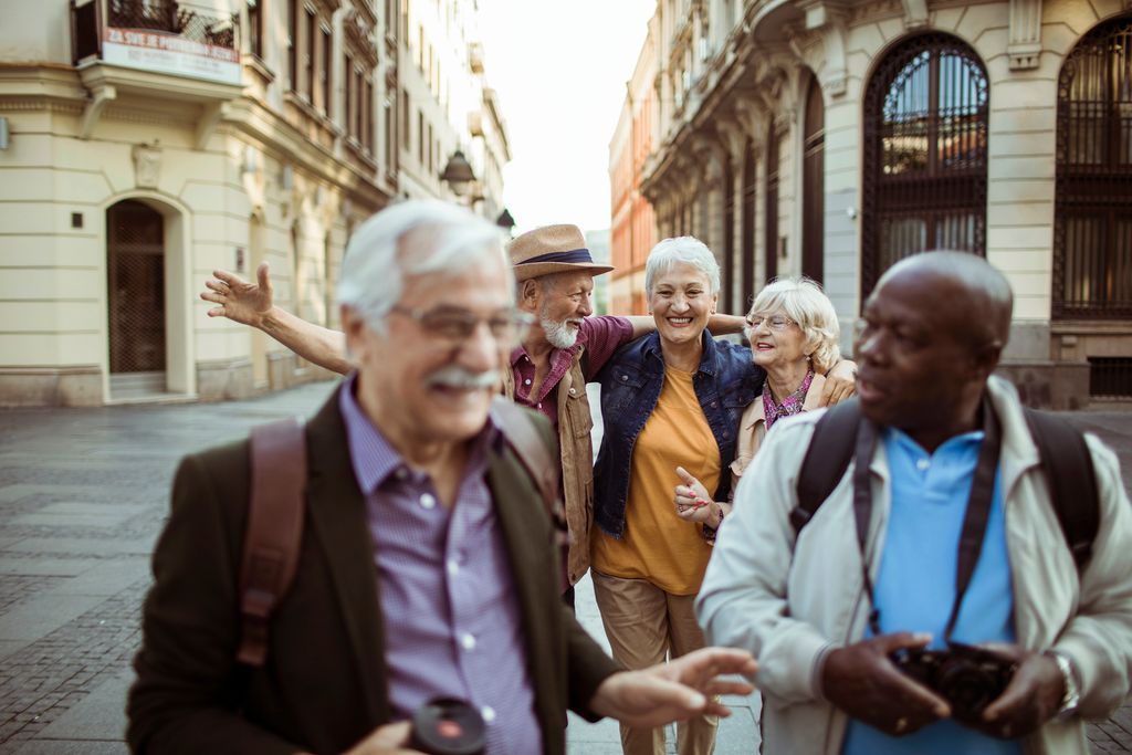 Group of friends exploring the city on their vacation together