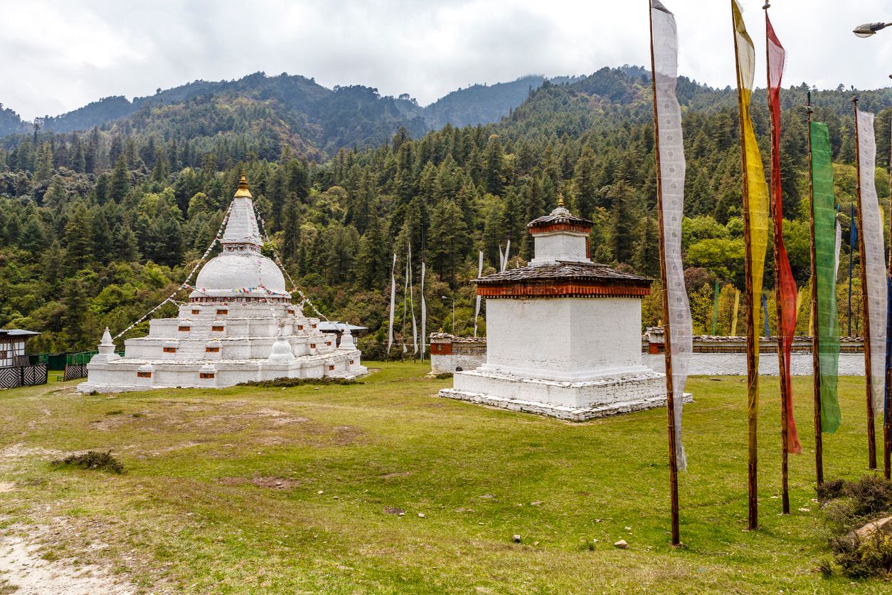 White stupa and temple in the mountains Chendebji Chorten, Phobjikha Valley, Bhutan