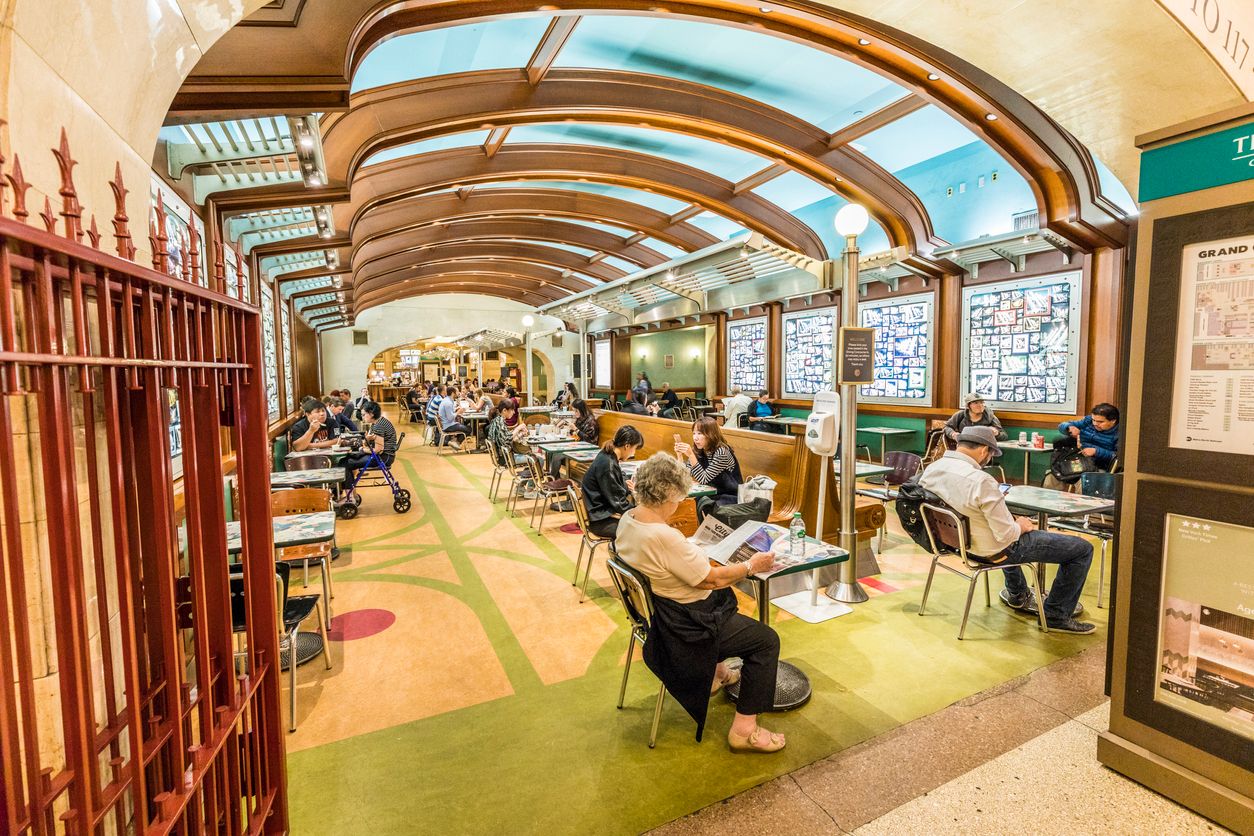 People enjoy the food area in Grand Central Terminal