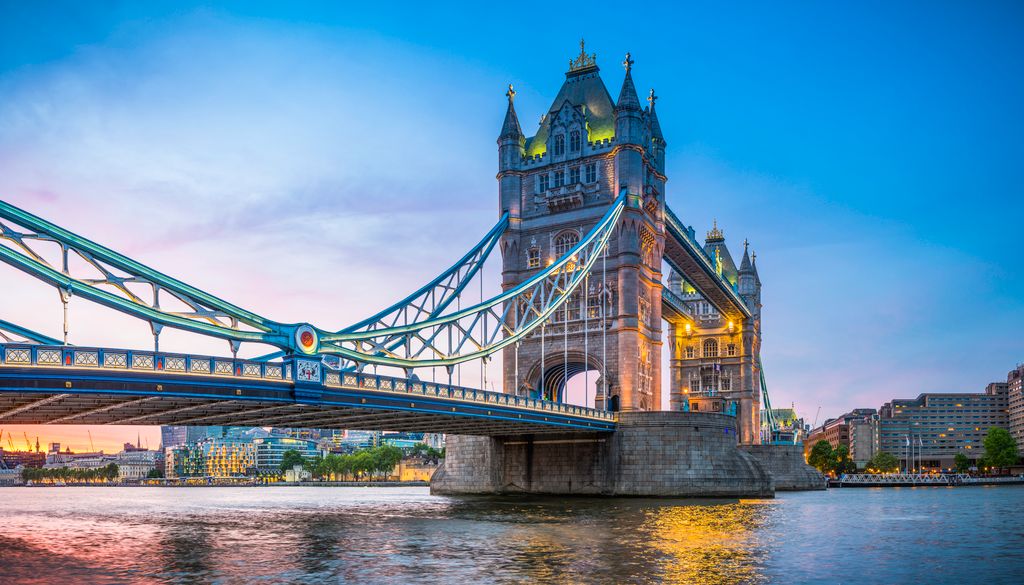 London Tower Bridge illuminated at sunset over River Thames