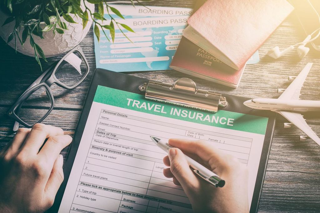 Traveler filling out a travel insurance form