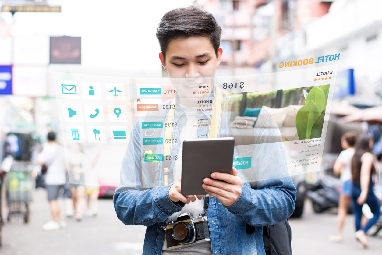 tourist using mobile application technology booking hotel online.