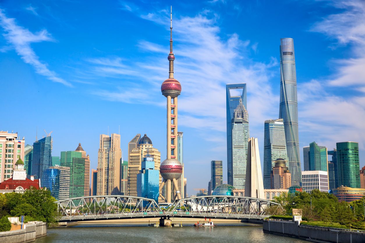 Shanghai skyline with historical Waibaidu bridge and the Oriental Pearl Tower, China