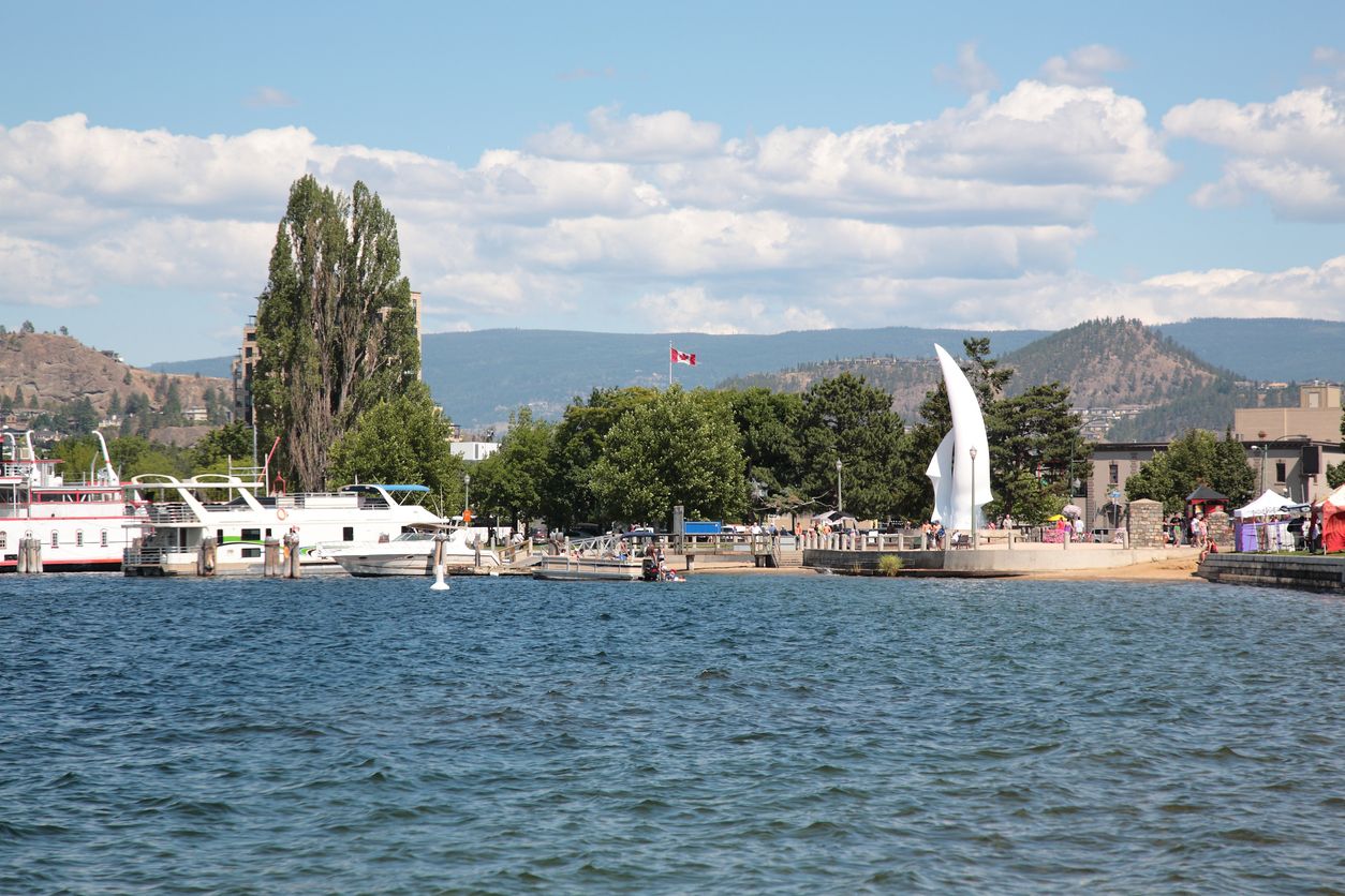 View of Okanagan Lake waterfront with iconic sculpture The Spirit of Sail in Kelowna , BC, Canada