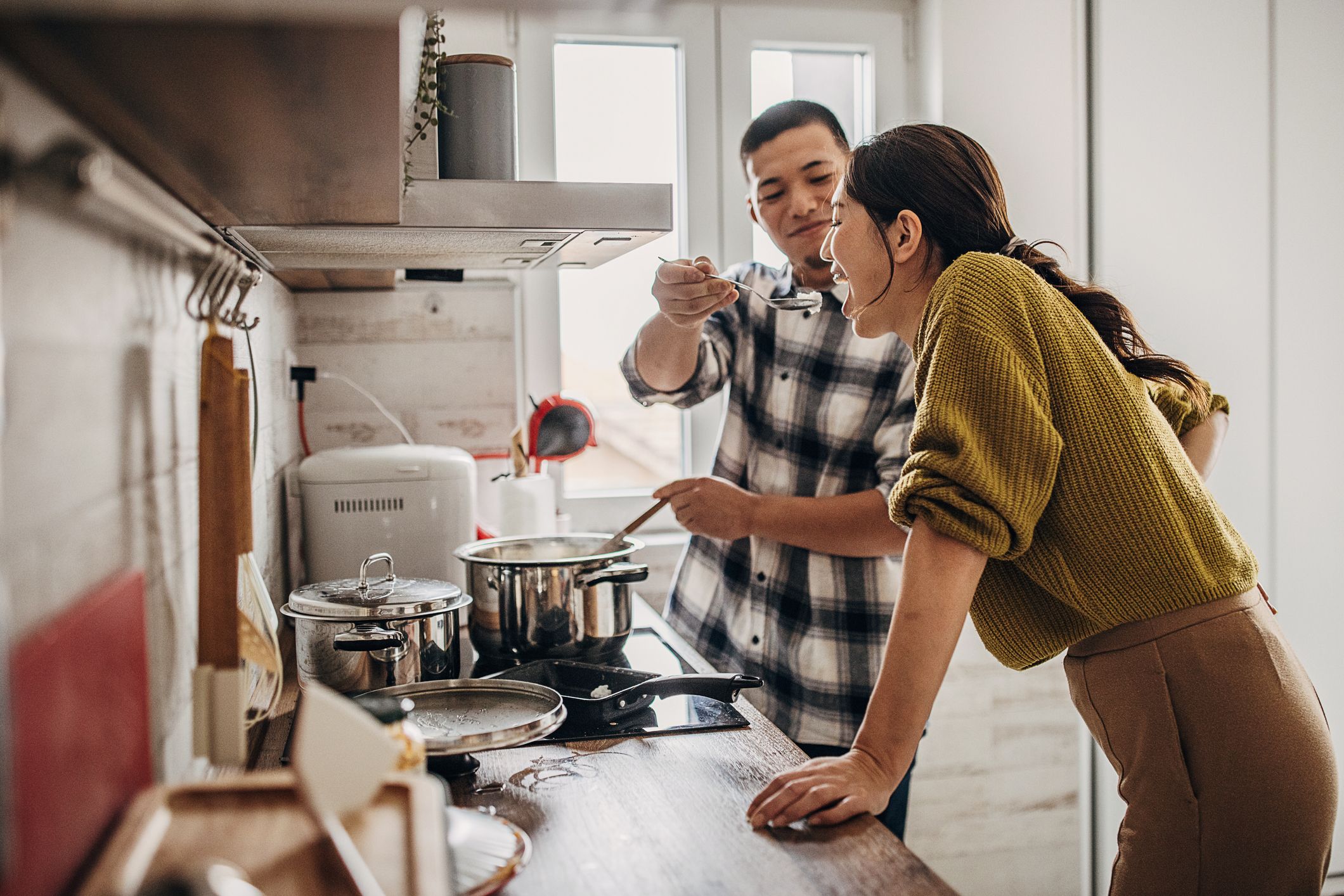 Husband is cooking for his wife