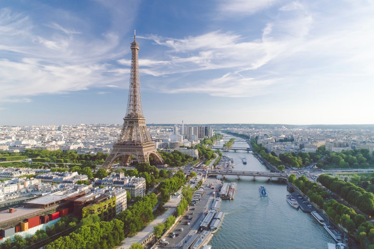Aerial view of Paris with Eiffel tower during sunset