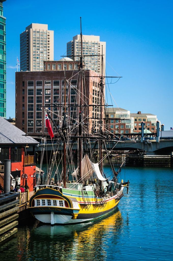 A group of tourists walk along Griffin's Wharf as they prepare to tour the "Eleanor"
