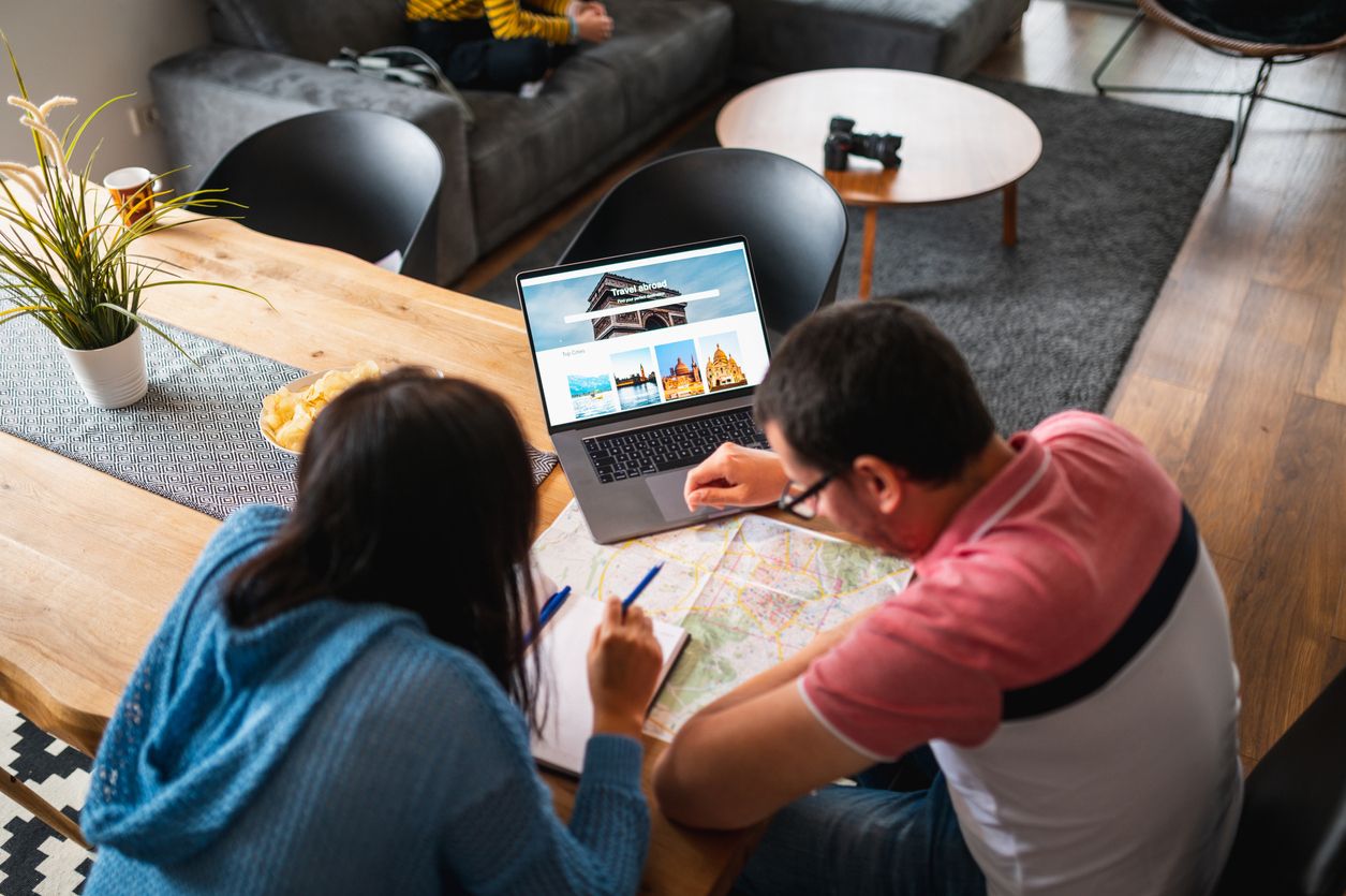 Couple booking their next vacation.