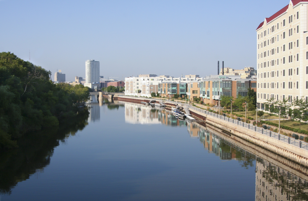 View of the Milwaukee and the Milwaukee River near several breweries. Pictured from the Oak Leaf Trail underneath N. Van Buren and Holten Street.