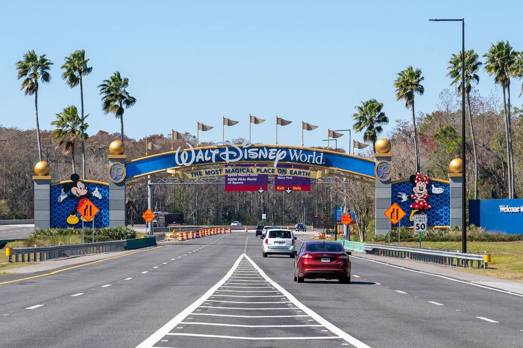 Walt Disney World arch gate on the road in Orlando, Florida, USA