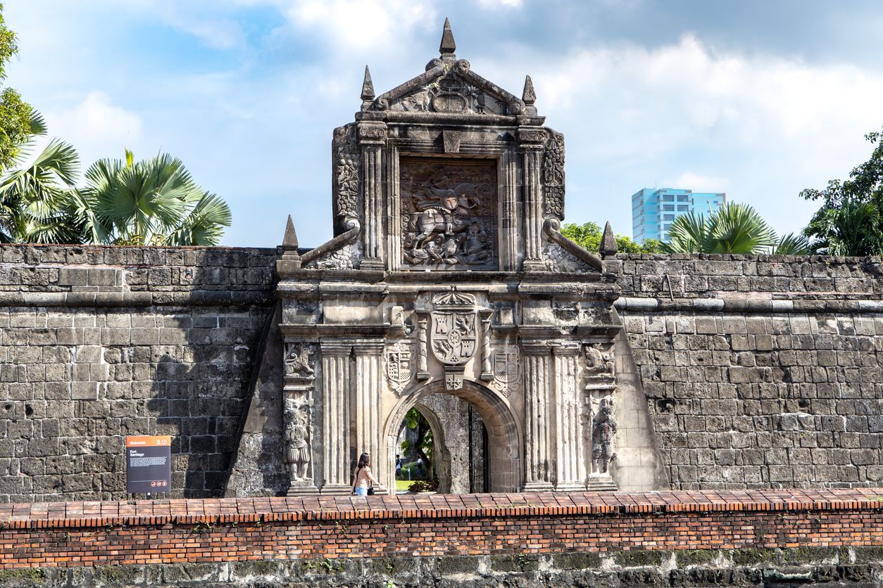 People walking through the park in Fort Santiago at Intramuros, Manila , Philippines
