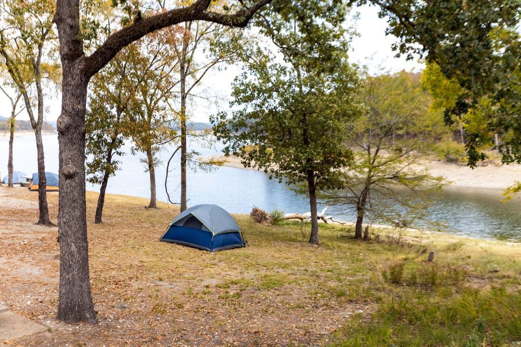 Camping tents near a beautiful lake, campsite, adventure vacation concept. Broken bow lake, Oklahoma