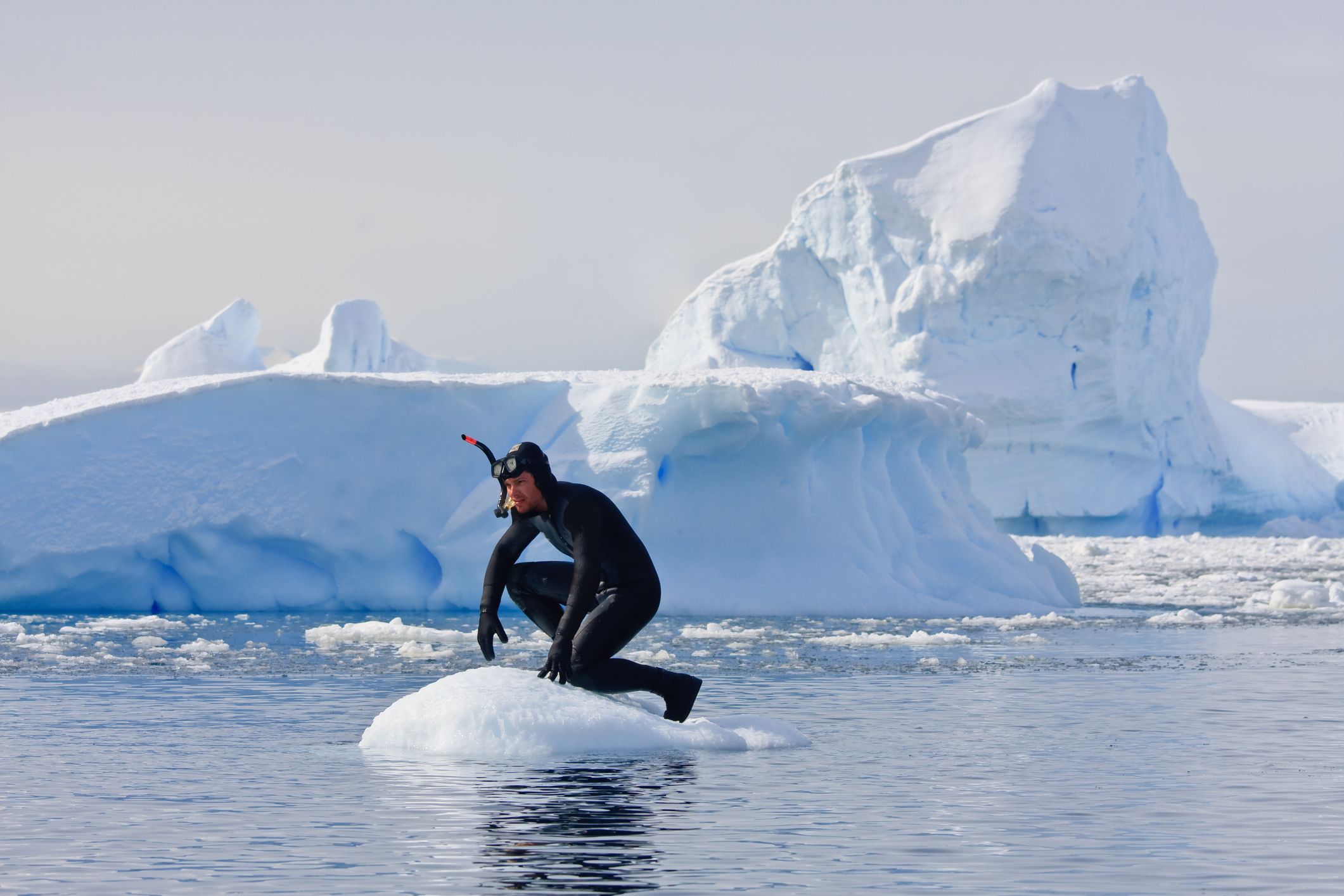 Diver on the ice in Antarctica