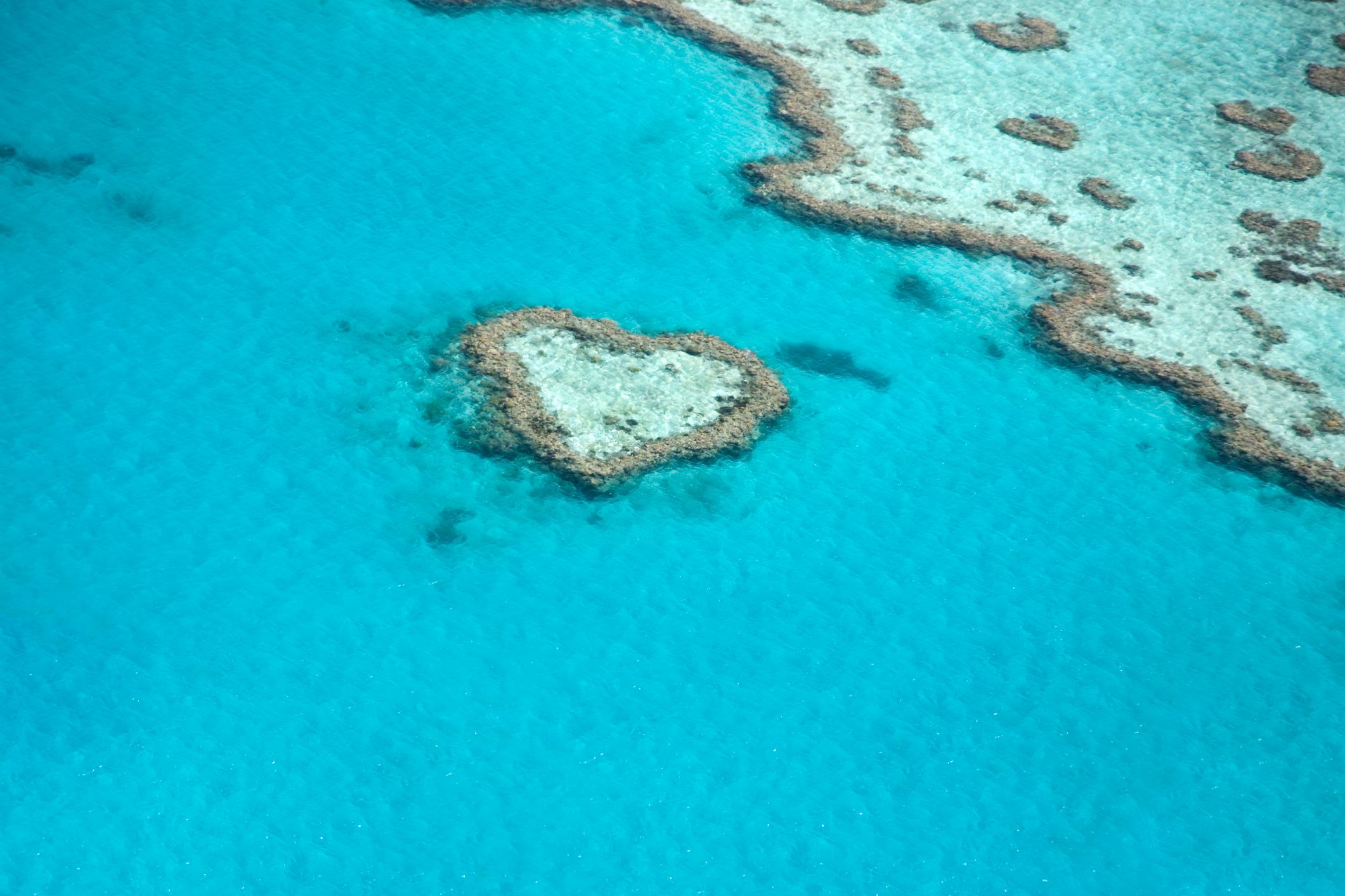 An aerial view of Heart Reef, situated within the Great Barrier Reef, Australia