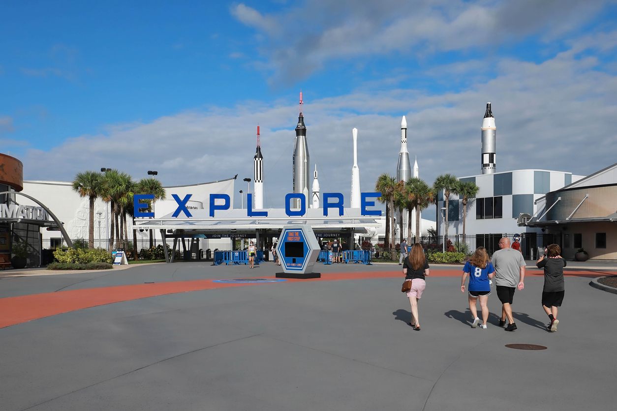Family enters the Kennedy Space Center Visitor Complex in Cape Canaveral.