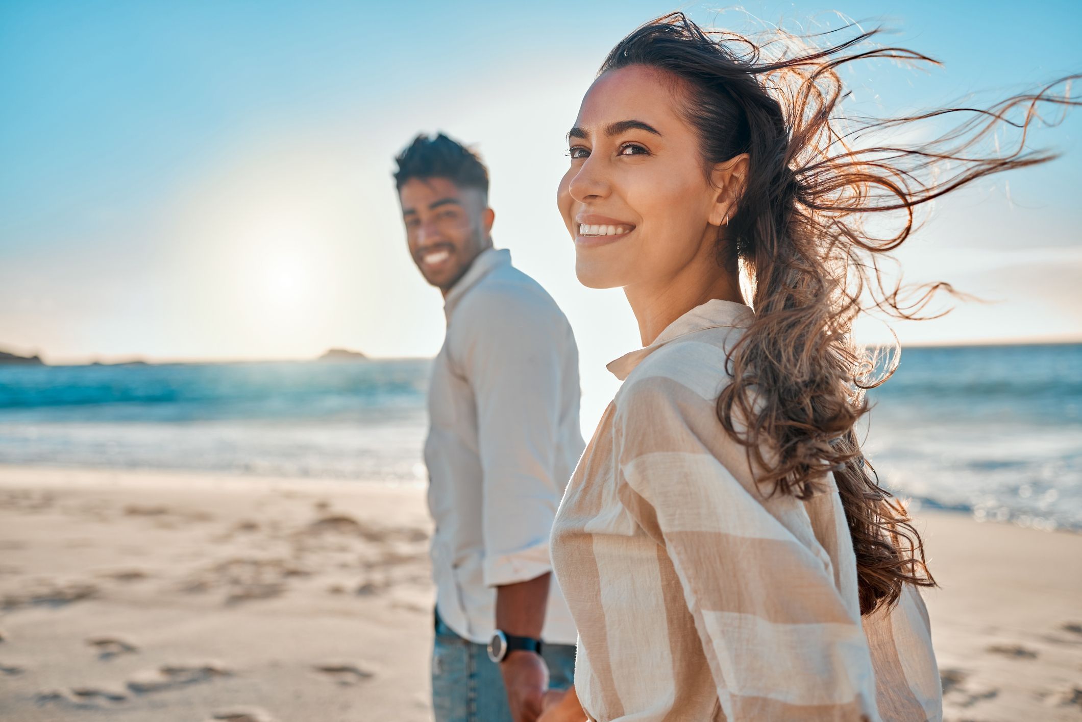 Young couple spending time together at the beach