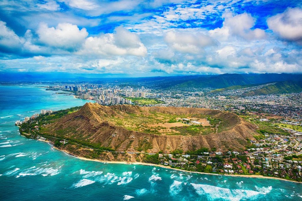 Aerial of Honolulu, Hawaii beyond Diamond Head on the Island of Oahu.
